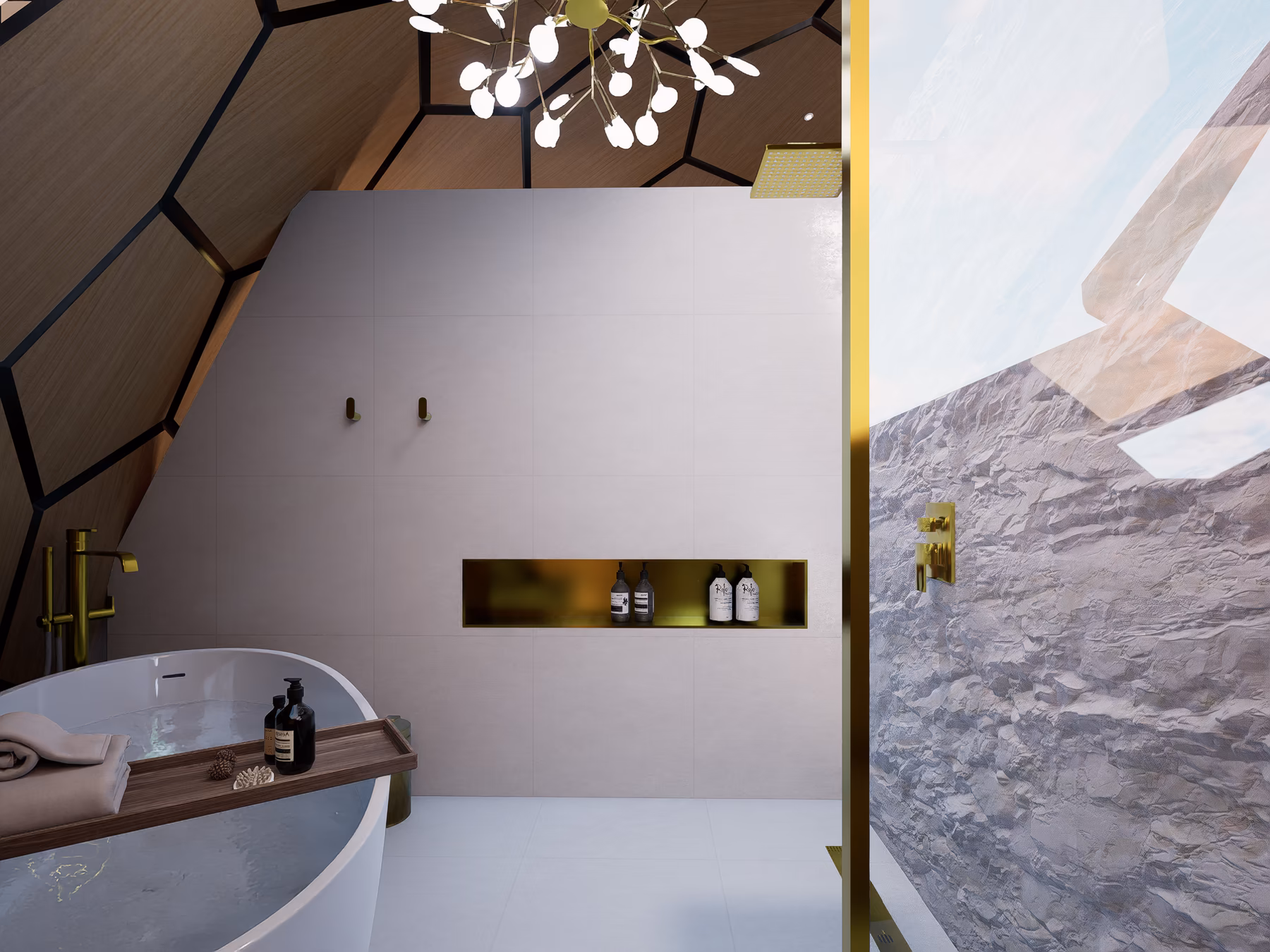 A freestanding bathtub against the niche wall, a walk-in stone shower beyond, brass fittings throughout